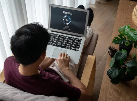 Software update on computer for modish version of device software 스톡 사진