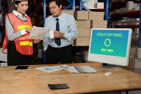 Software update on computer for modish version of device software Stock Photos