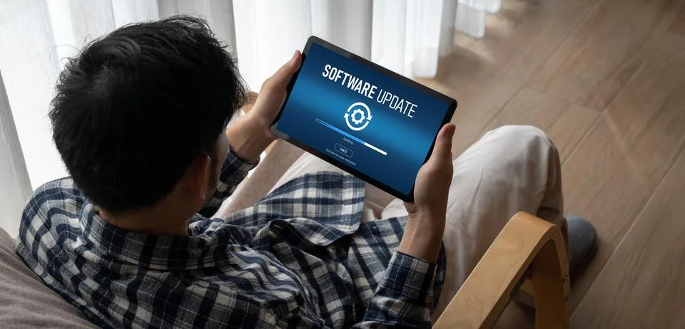 Software update on computer for modish version of device software Stock Photos