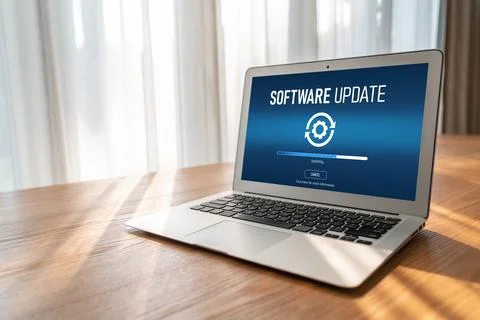 Software update on computer for modish version of device software Stock Photos