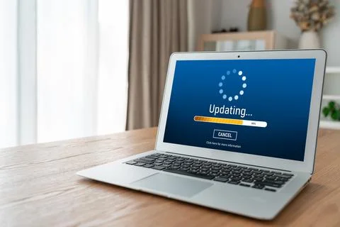 Software update on computer for modish version of device software 스톡 사진