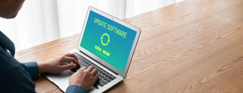 Software update on computer for modish version of device software Stock Photos