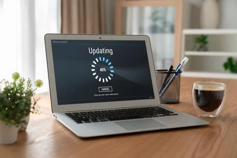 Software update on computer for modish version of device software Stockfoto's