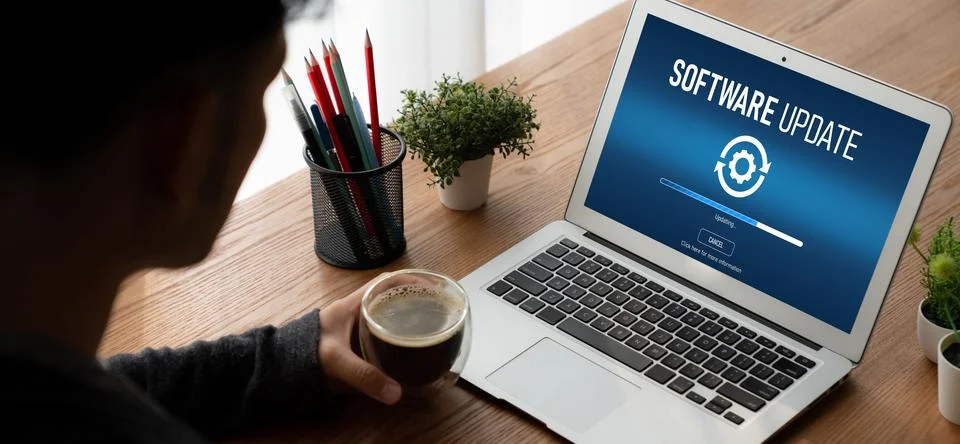 Software update on computer for modish version of device software 스톡 사진