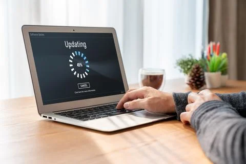 Software update on computer for modish version of device software Stock Photos