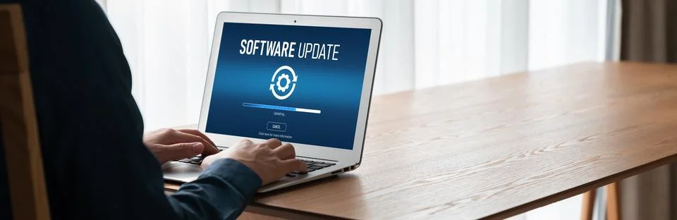 Software update on computer for modish version of device software Stock Photos