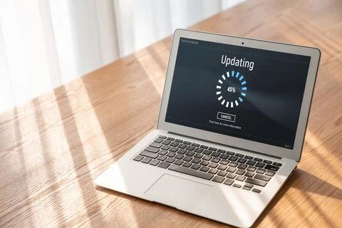 Software update on computer for modish version of device software Stock Photos