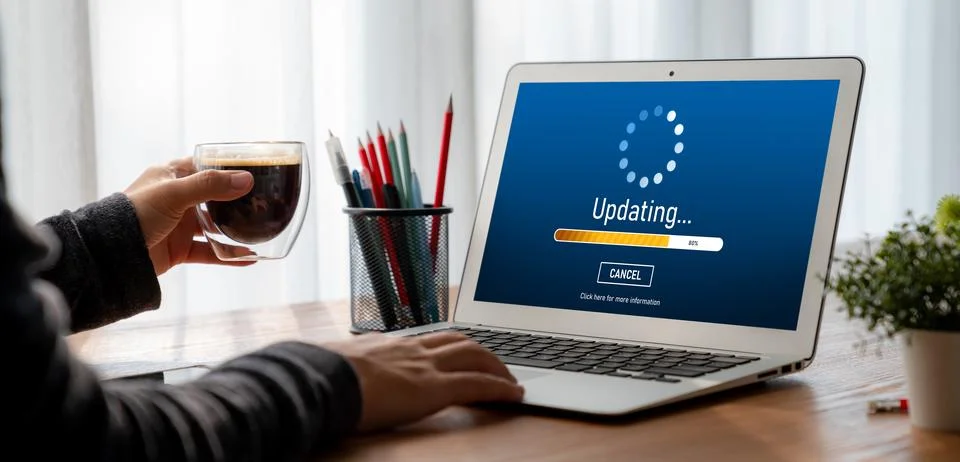 Software update on computer for modish version of device software 写真素材