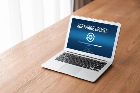 Software update on computer for modish version of device software Stock Photos