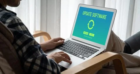 Software update on computer for modish version of device software Stockfoto's