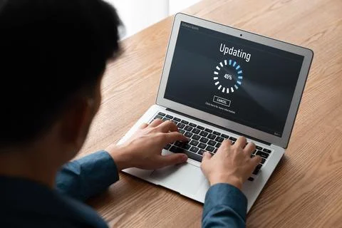 Software update on computer for modish version of device software 스톡 사진