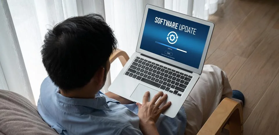 Software update on computer for modish version of device software 스톡 사진