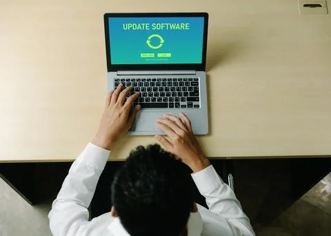 Software update on computer for modish version of device software 스톡 사진