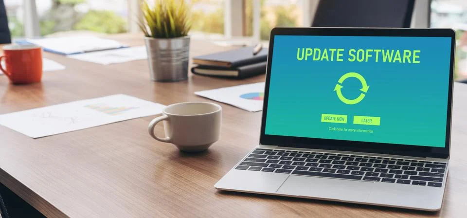 Software update on computer for modish version of device software Stock Photos
