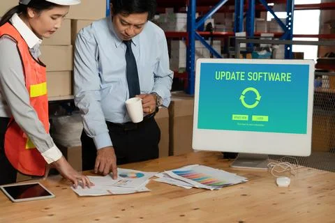 Software update on computer for modish version of device software Stock Photos