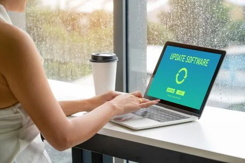 Software update on computer for modish version of device software Stock Photos