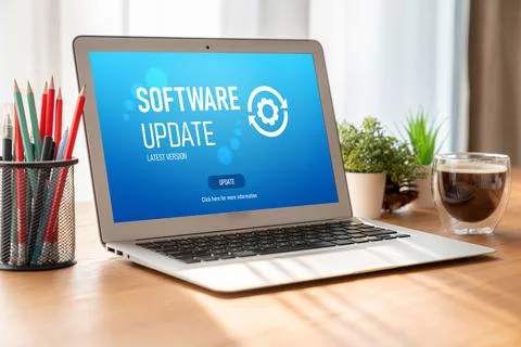 Software update on computer for modish version of device software Stock Photos