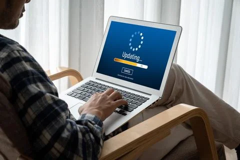 Software update on computer for modish version of device software 스톡 사진