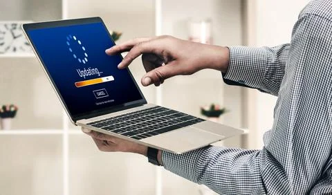 Software update on computer for modish version of device software Foto stock