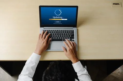 Software update on computer for modish version of device software 스톡 사진