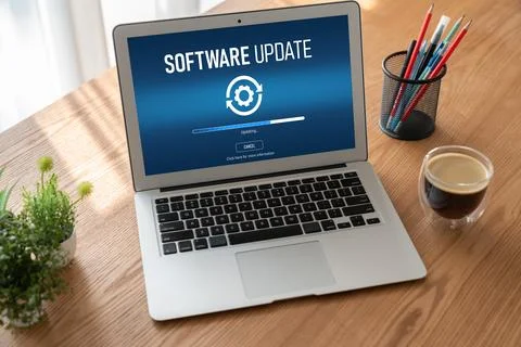 Software update on computer for modish version of device software Stock Photos