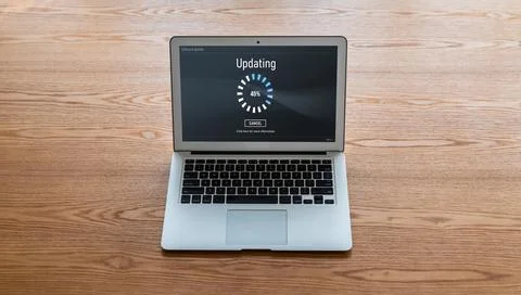 Software update on computer for modish version of device software Stock Photos