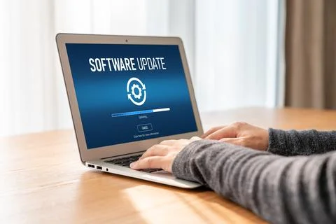 Software update on computer for modish version of device software Stock Photos