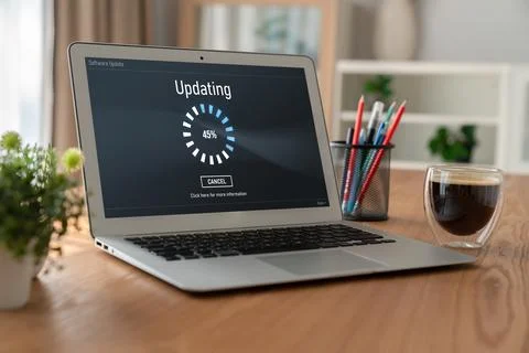 Software update on computer for modish version of device software Foto stock