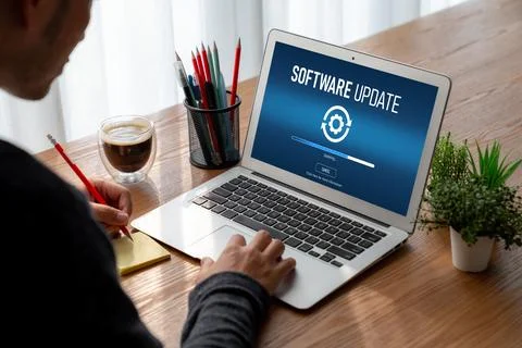 Software update on computer for modish version of device software 스톡 사진