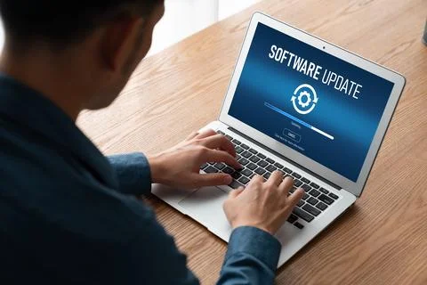 Software update on computer for modish version of device software Stock Photos