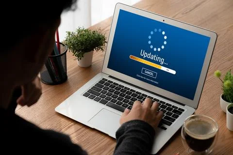 Software update on computer for modish version of device software Foto stock