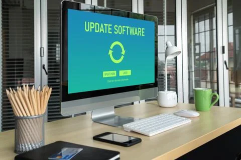 Software update on computer for modish version of device software Stockfoto's