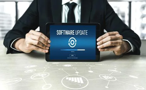 Software update on computer for modish version of device software Stock Photos