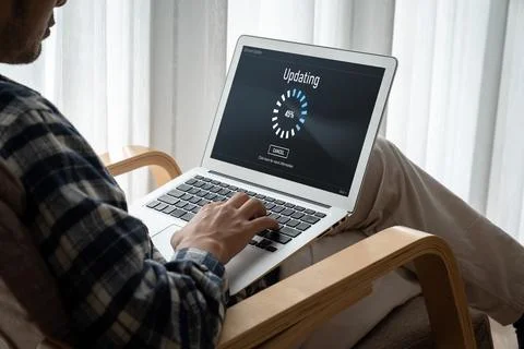 Software update on computer for modish version of device software 스톡 사진