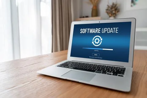 Software update on computer for modish version of device software Stock Photos