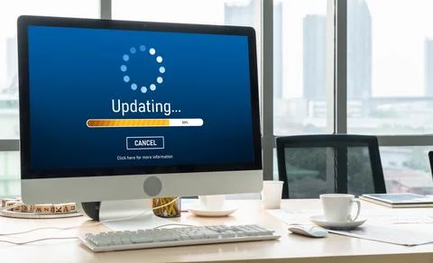 Software update on computer for modish version of device software Stock Photos