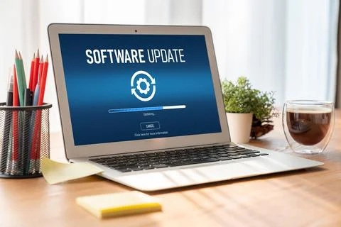 Software update on computer for modish version of device software Stock Photos