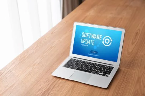 Software update on computer for modish version of device software Stock Photos