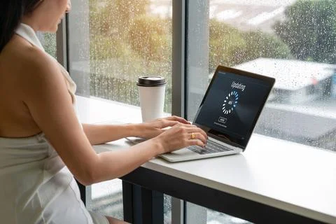Software update on computer for modish version of device software Stock Photos