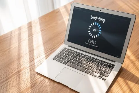 Software update on computer for modish version of device software Stock Photos