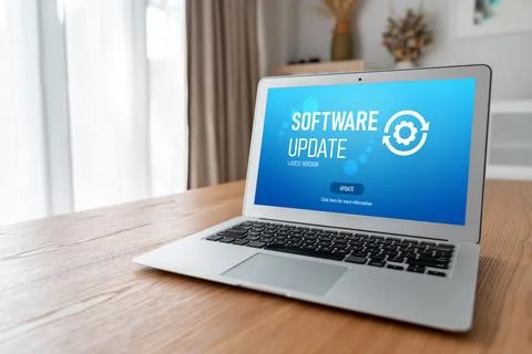 Software update on computer for modish version of device software Stock Photos