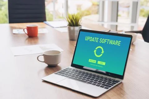 Software update on computer for modish version of device software Stock Photos