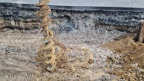 Soil auger, close-up. Construction special equipment. Repair work Stock Footage 312261464