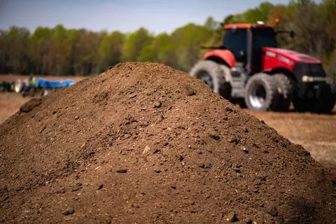 Soil background shows earth texture and erosion. Soil cultivation supports rural Stock Photos