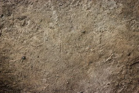 Soil brown ground surface top view texture and background. Stock Photos