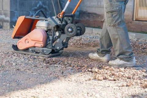 Soil compaction process Stock Photos