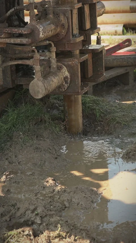 Soil Core Sample Removed from Drilling Pipe. vertical shooting video Stock Footage 330020371
