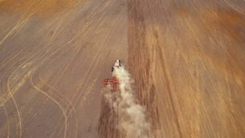 Soil cultivation field use tractor. Disk harrow on plowing field Stock-Footage 167040803