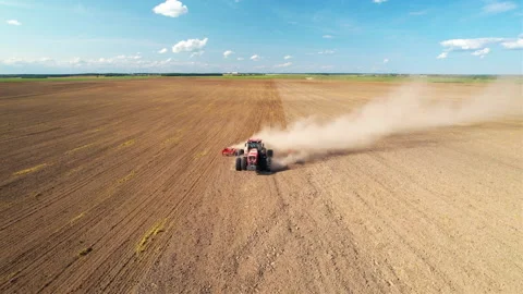Soil cultivation field use tractor. Disk harrow on plowing field Video stock 167064124