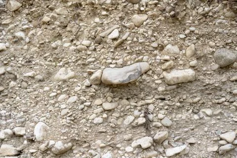 Soil layer with various stones Stock Photos